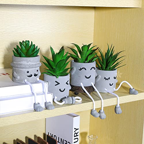 Kunstsukkulenten im Betontopf mit Gesichtern